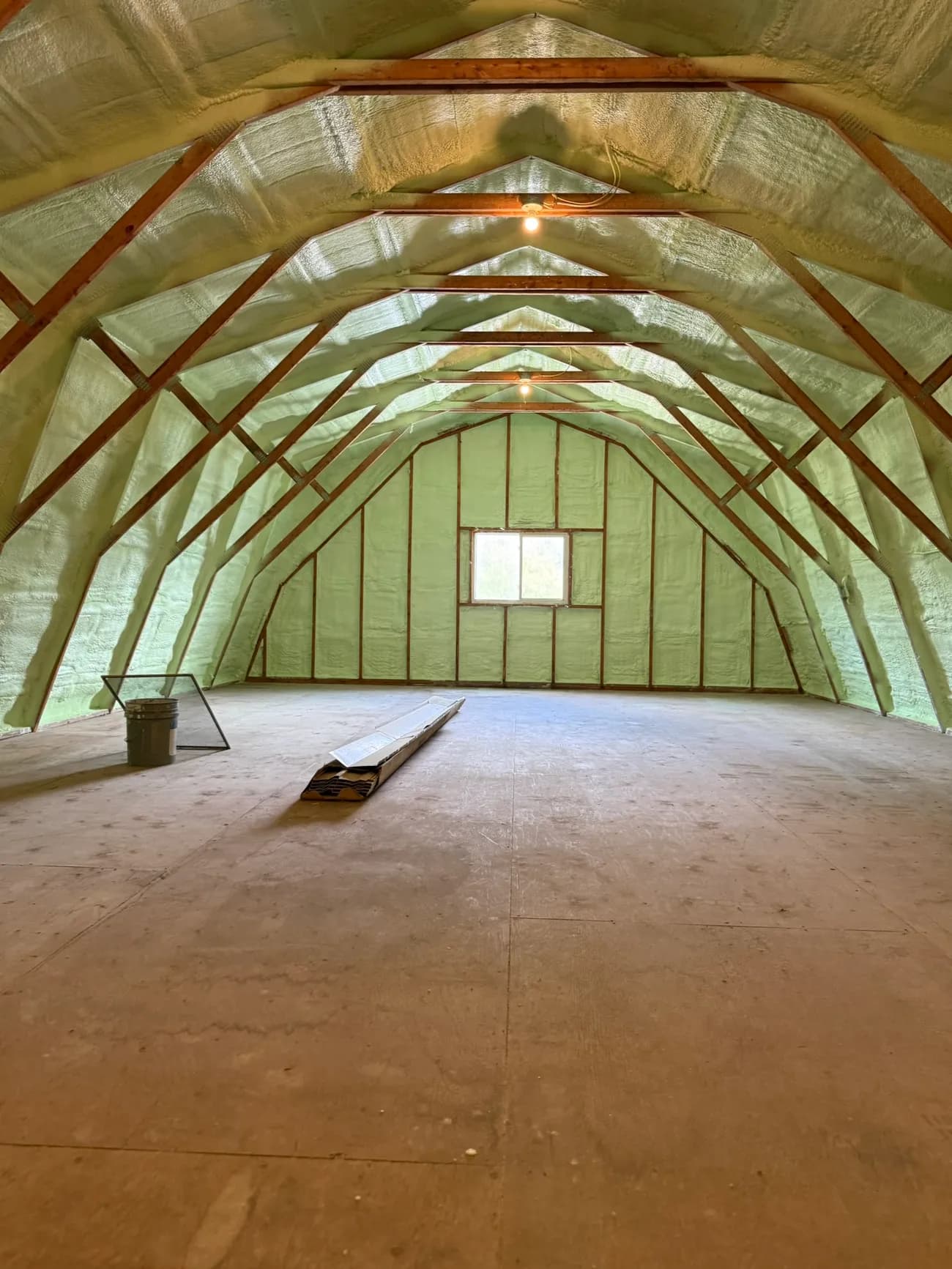 Cathedral ceiling insulated with closed-cell spray foam between the rafters