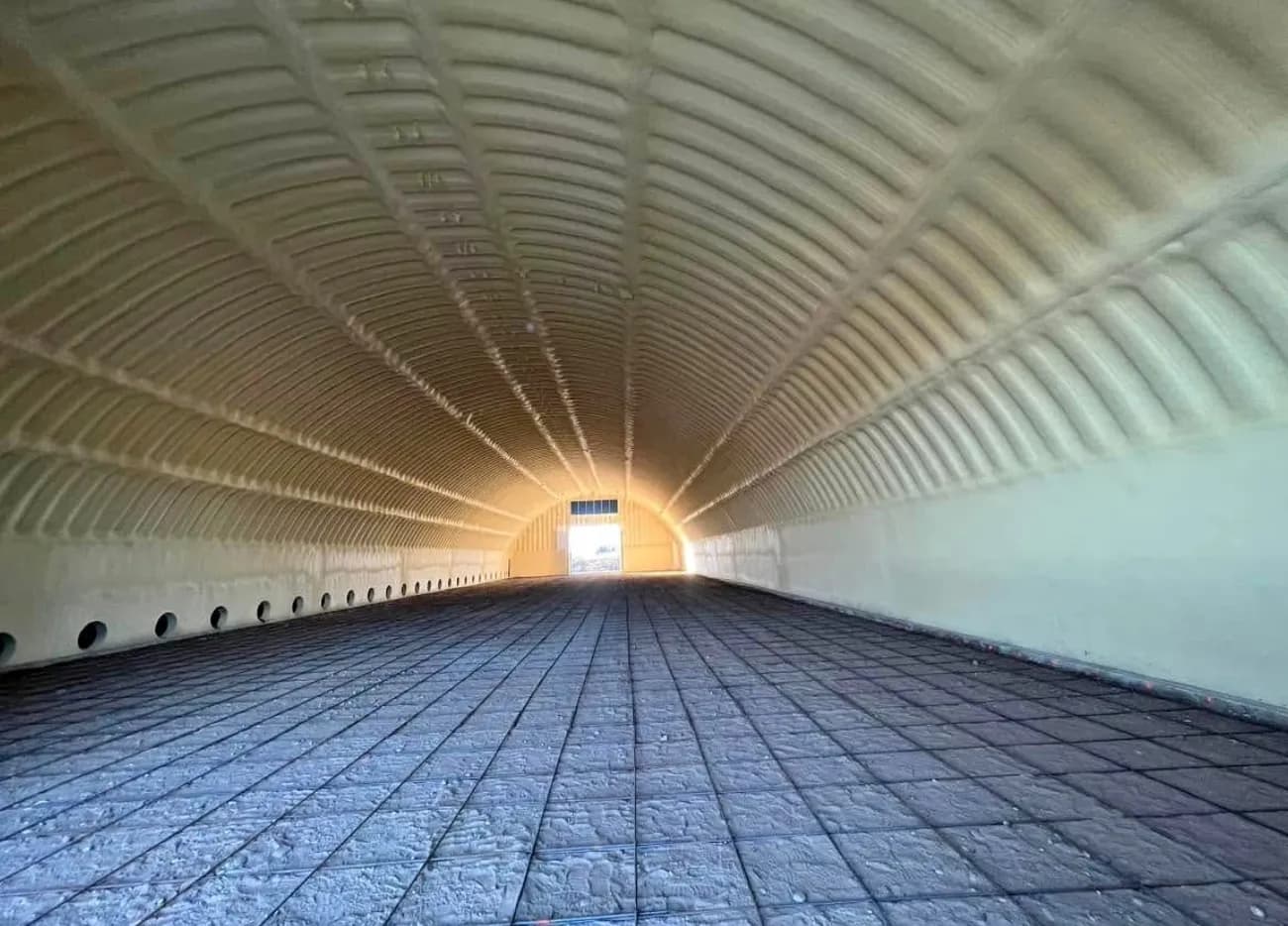 Cold storage building insulated with closed-cell spray foam