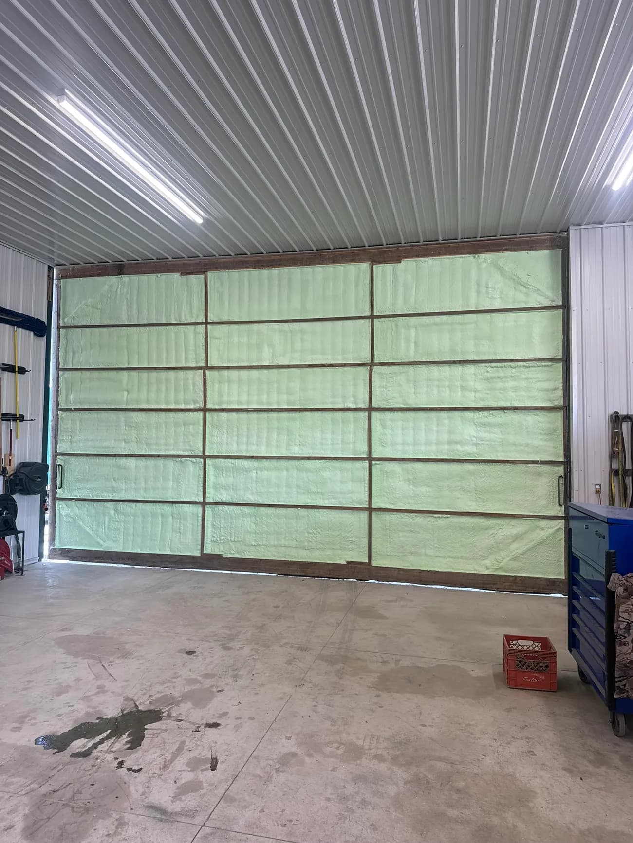 Garage interior insulated with closed-cell spray foam