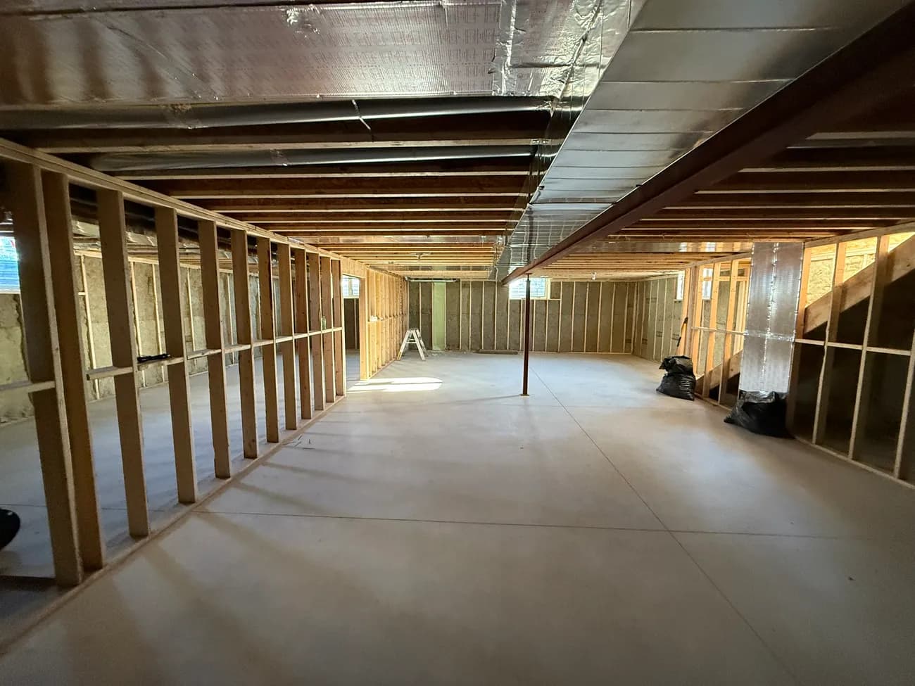 Rim joist bays sealed with closed-cell spray foam