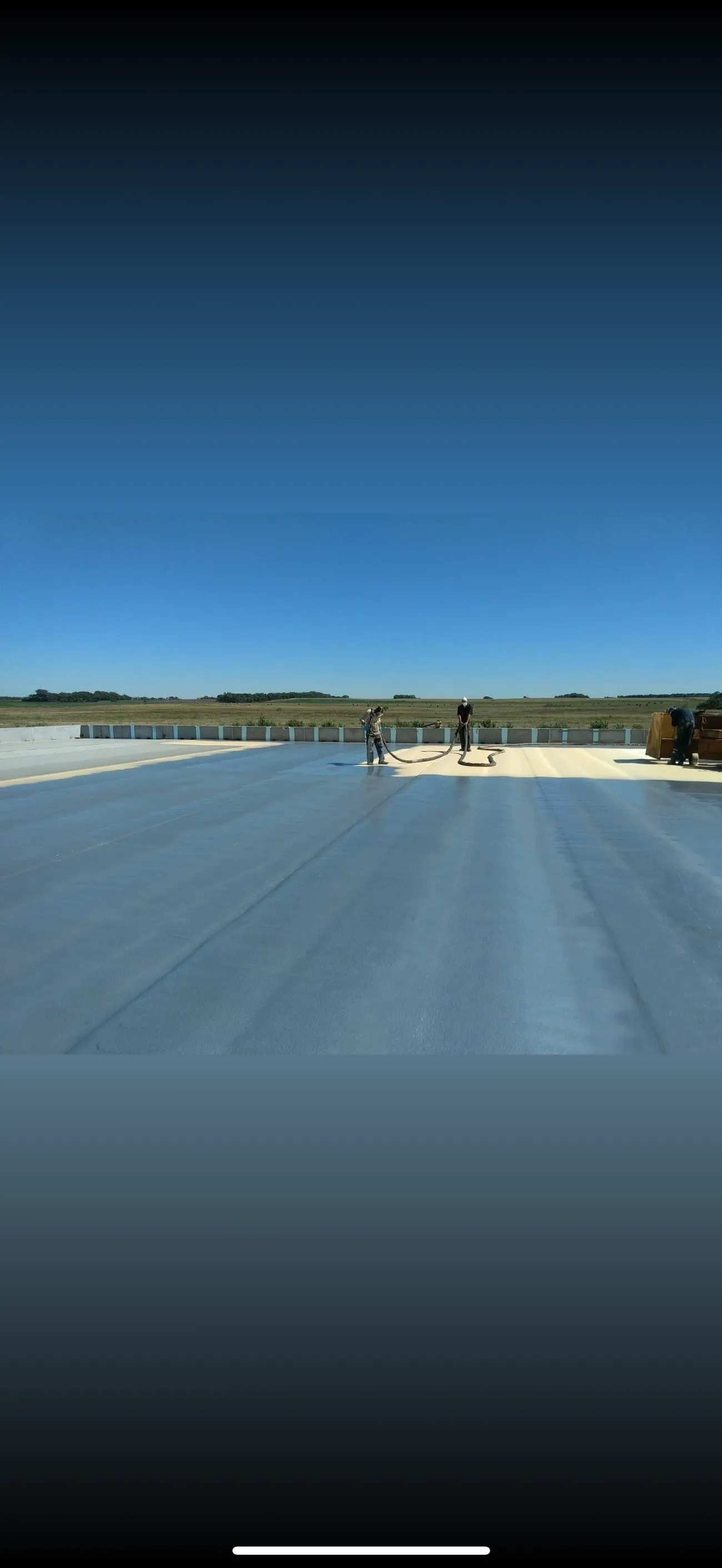 High-density spray foam applied to a large flat surface